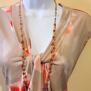 Siz2X, new with tags women blouse; Calvin Klein brand, beige with pink flowers.